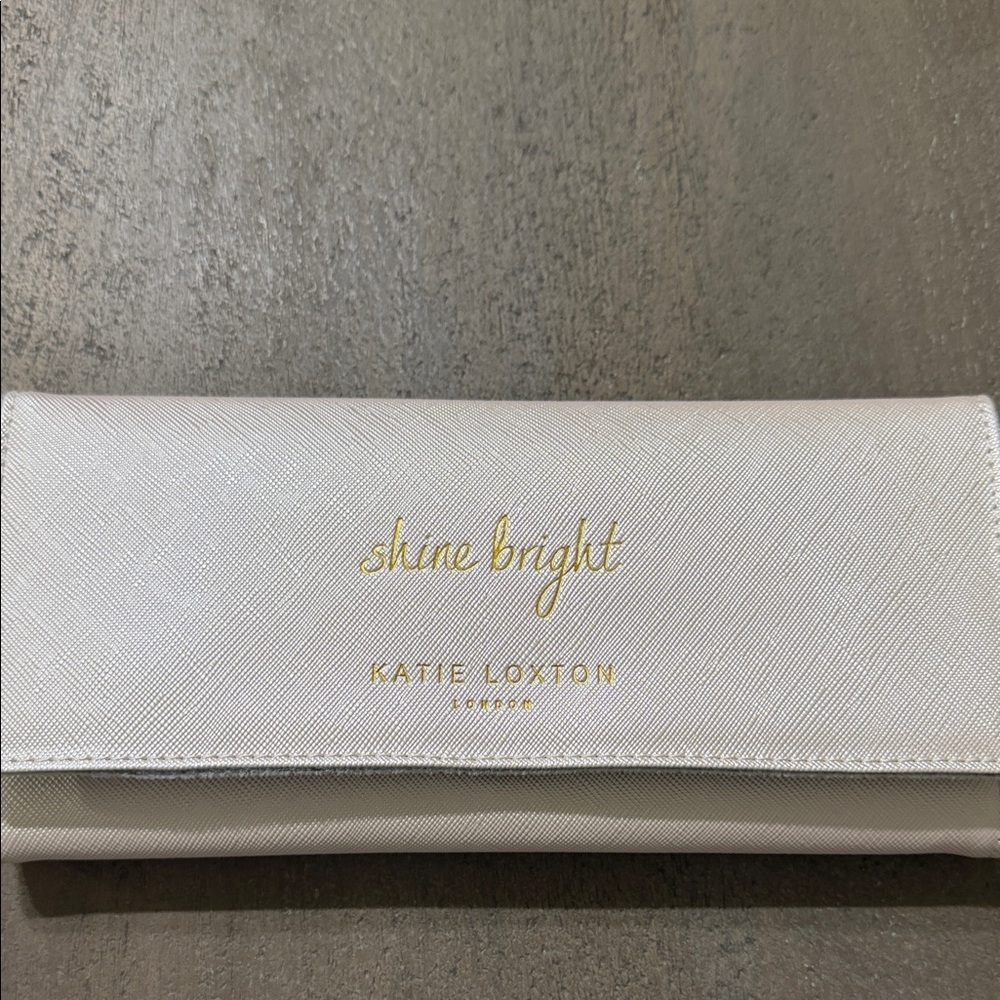 Katie Loxton travel jewelry holder.  Like new.White